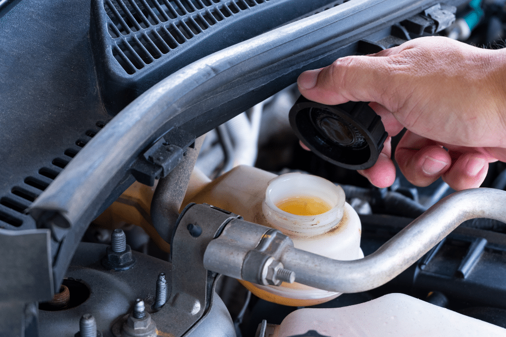 Spring Fluid Check in St. Cloud FL at FloState Auto Diesel Repair. Close-up of brake fluid check in a vehicle reservoir